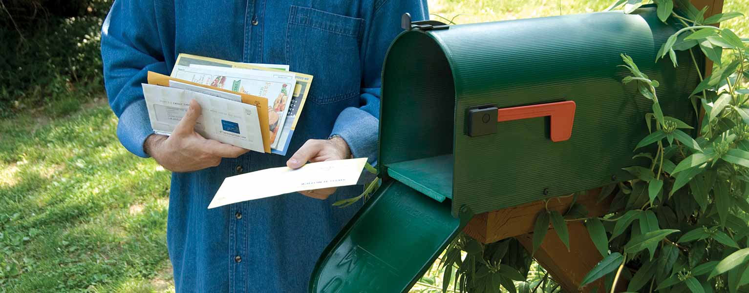 An image of a person getting the mail.